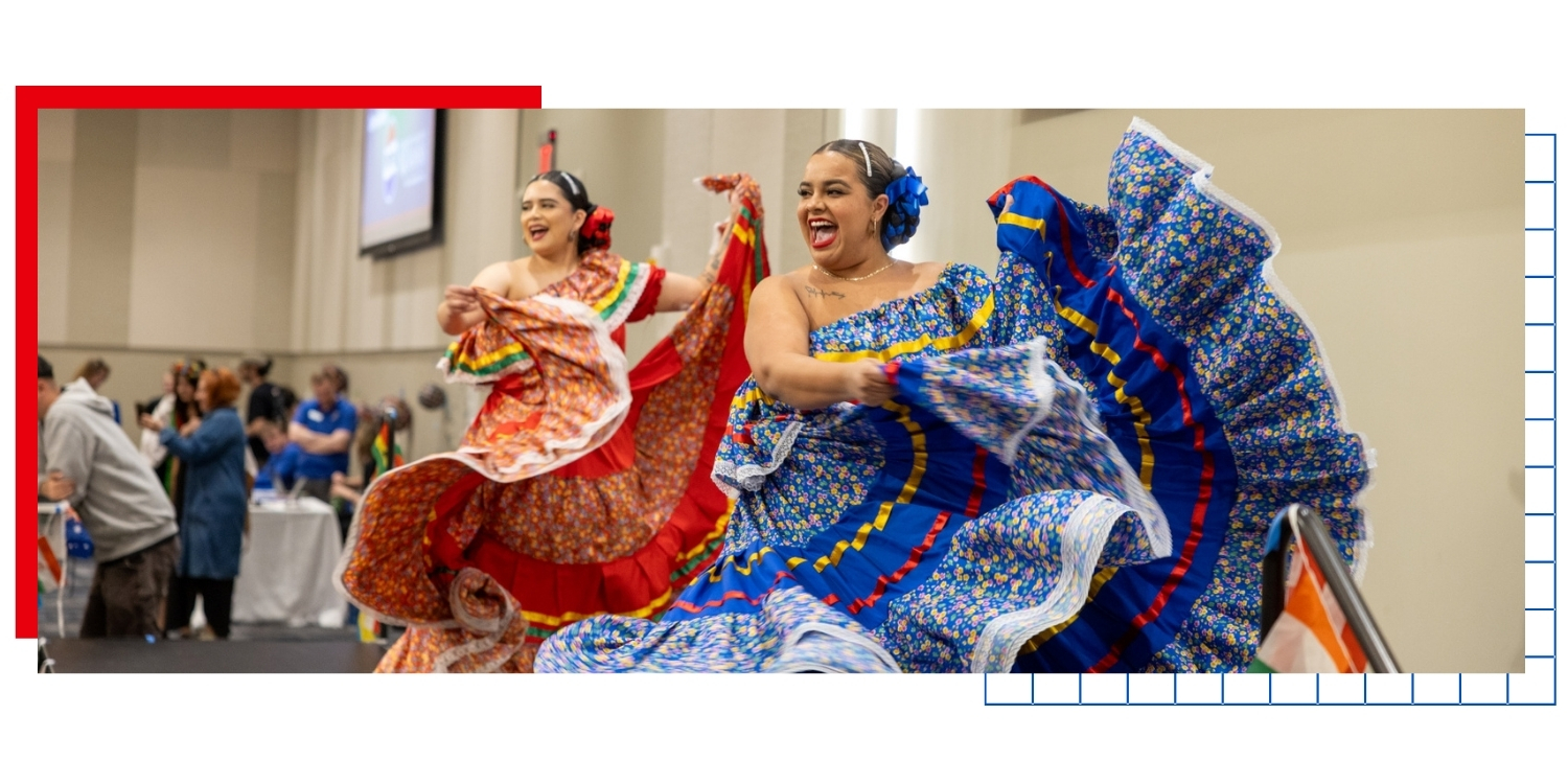 Dancers on stage at the International Jayhawk Festival at the University of Kansas.