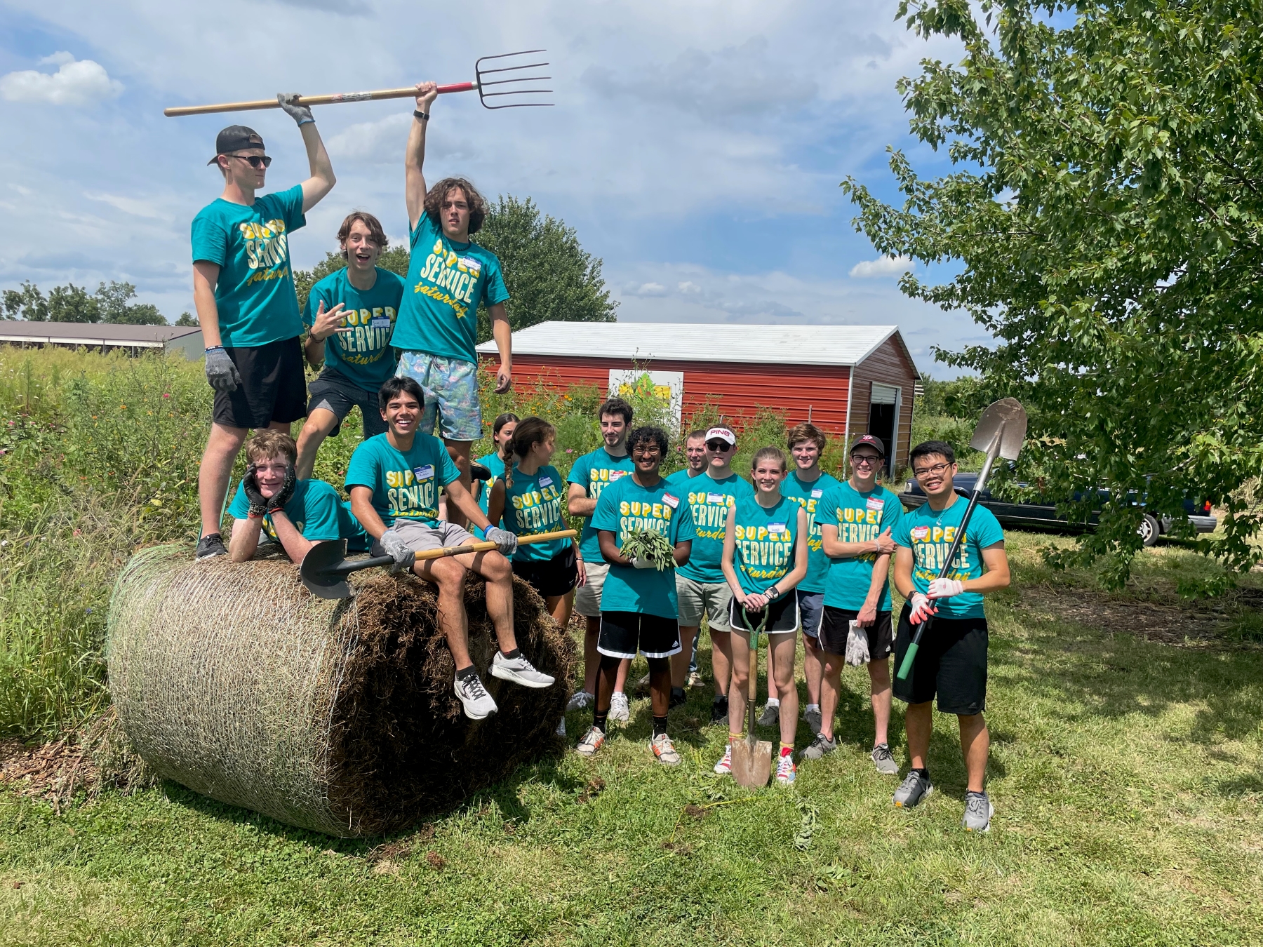 University of Kansas students participate in a gardening project for a Super Service Saturday community outreach program.