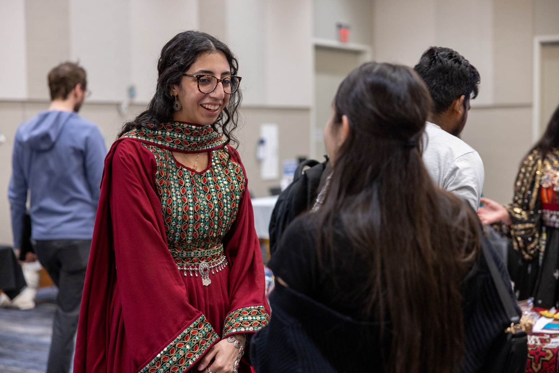 Students talk at the International Jayhawk Festival on the University of Kansas campus. 