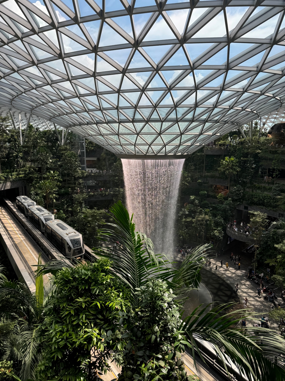 A photo of a glass building with a huge fountain style water feature submitted by a KU student on a study abroad trip to Asia.