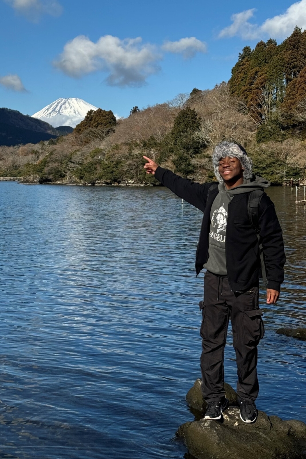 University of Kansas architecture student James Price poses in front of Mt. Fuji in Japan on an Asia study abroad trip.