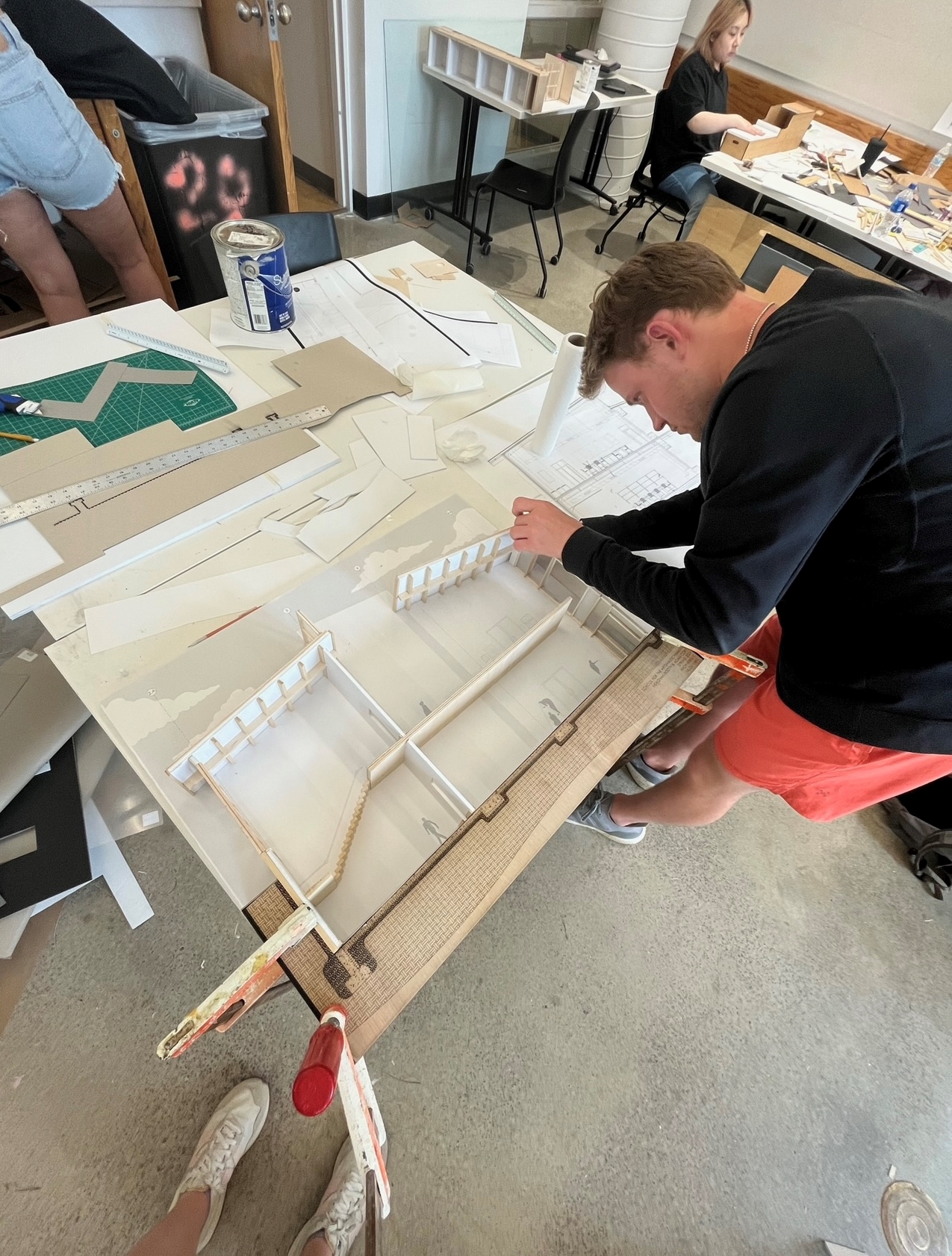 University of Kansas architecture student Adam Cory working on a detail section model for my integrated design studio that is meant to represent how the building would be constructed.