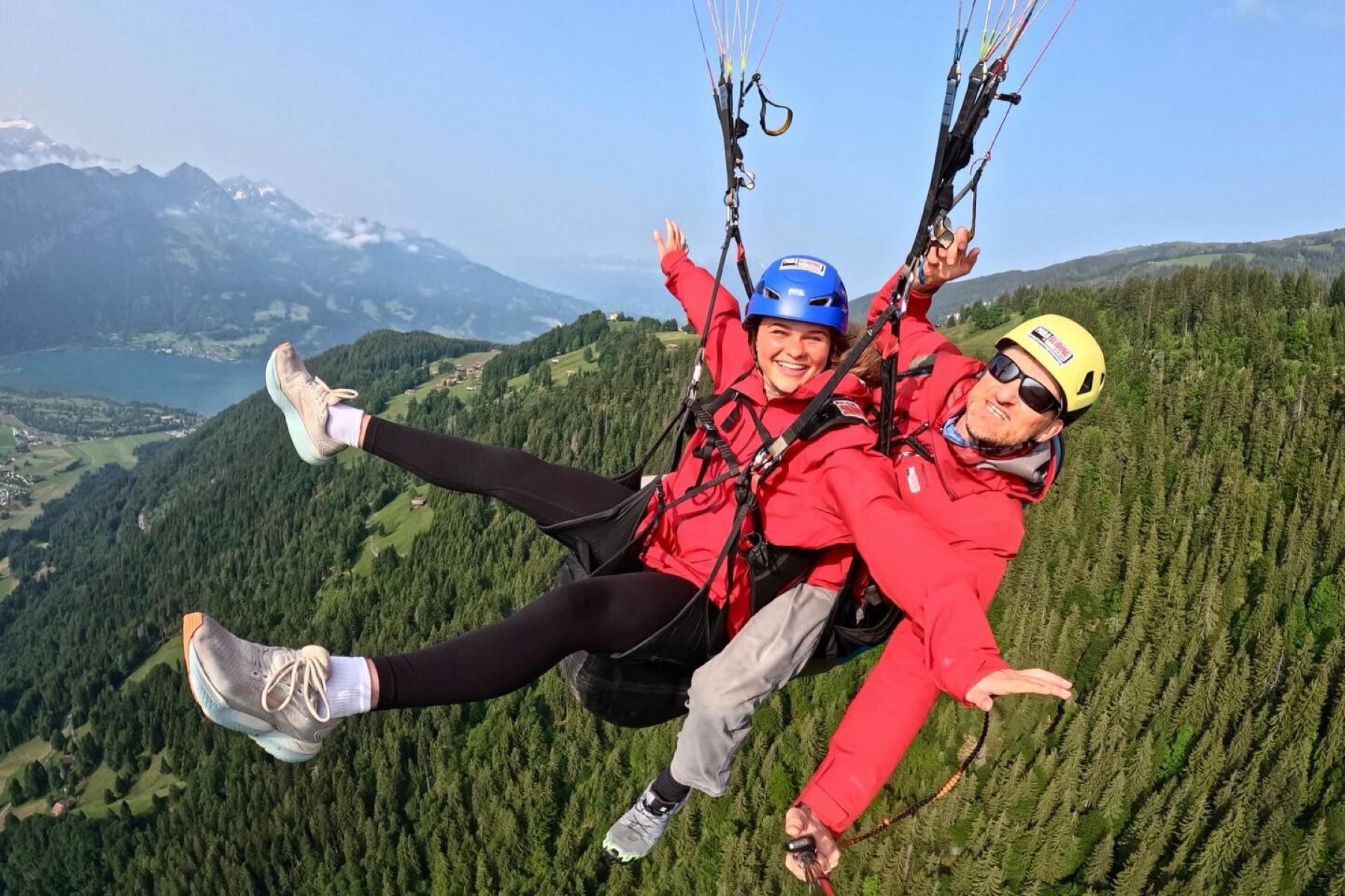 University of Kansas student Maren Rapp paragliding over Interlaken and the Swiss Alps 