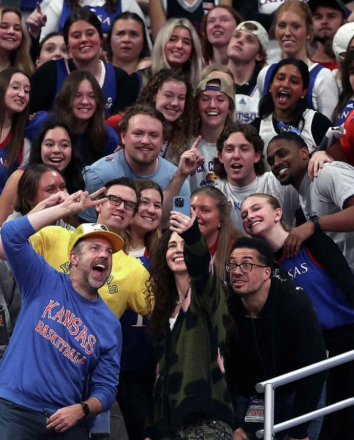 University of Kansas students pose for a selfie at a basketball game at Allen Fieldhouse with Jason Sudeikis 