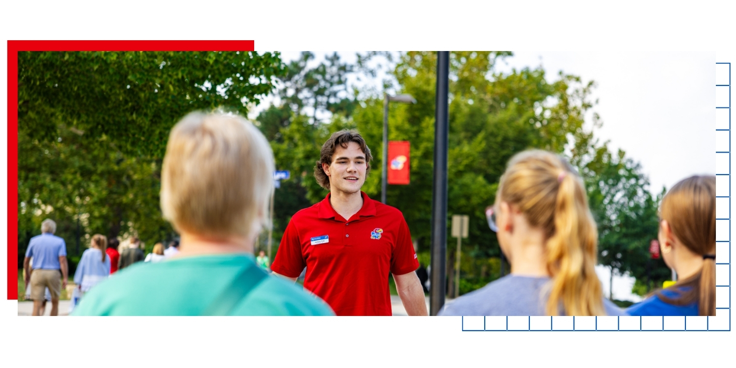 Student ambassador Jackson Fries takes future University of Kansas students on a KU campus tour.