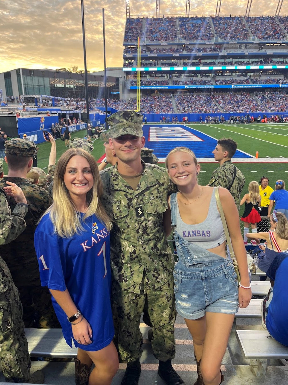 University of Kansas student Reagan Cherwin and her siblings at a KU football game.