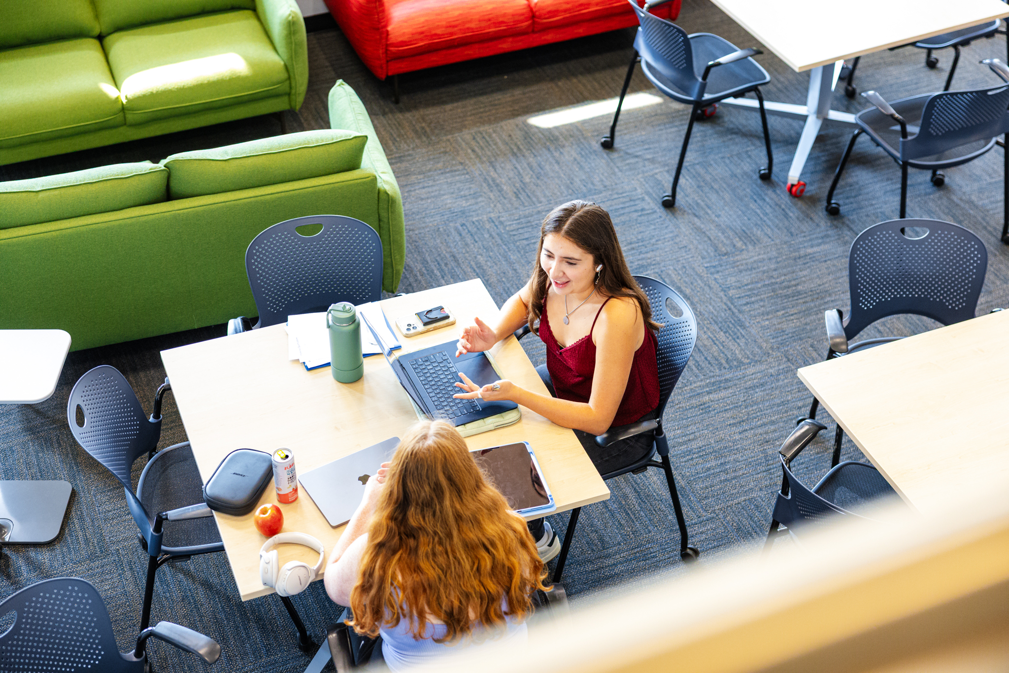 University of Kansas Honors student Valeria Solis studies with a friend in the honors lounge (now called The Kettle) at Watson Library.