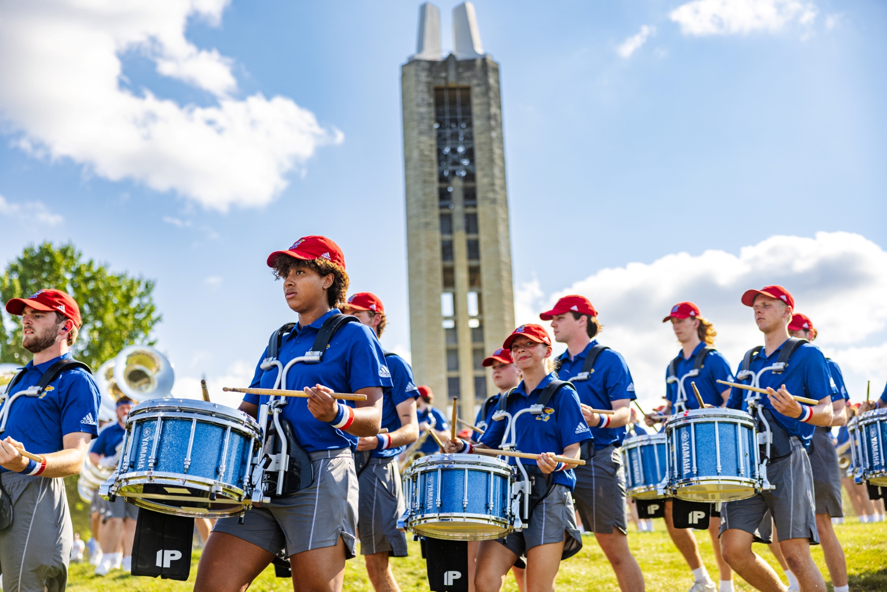 The University of Kansas Marching Jayhawks on the Hill in front of the David Booth Kansas Memorial Stadium during Family Weekend.