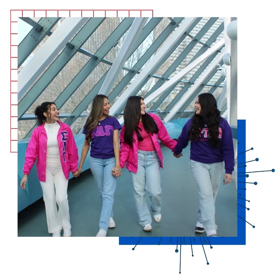 University of Kansas student Annalia Escalante posts for a portrait with her sorority sisters in their jackets 