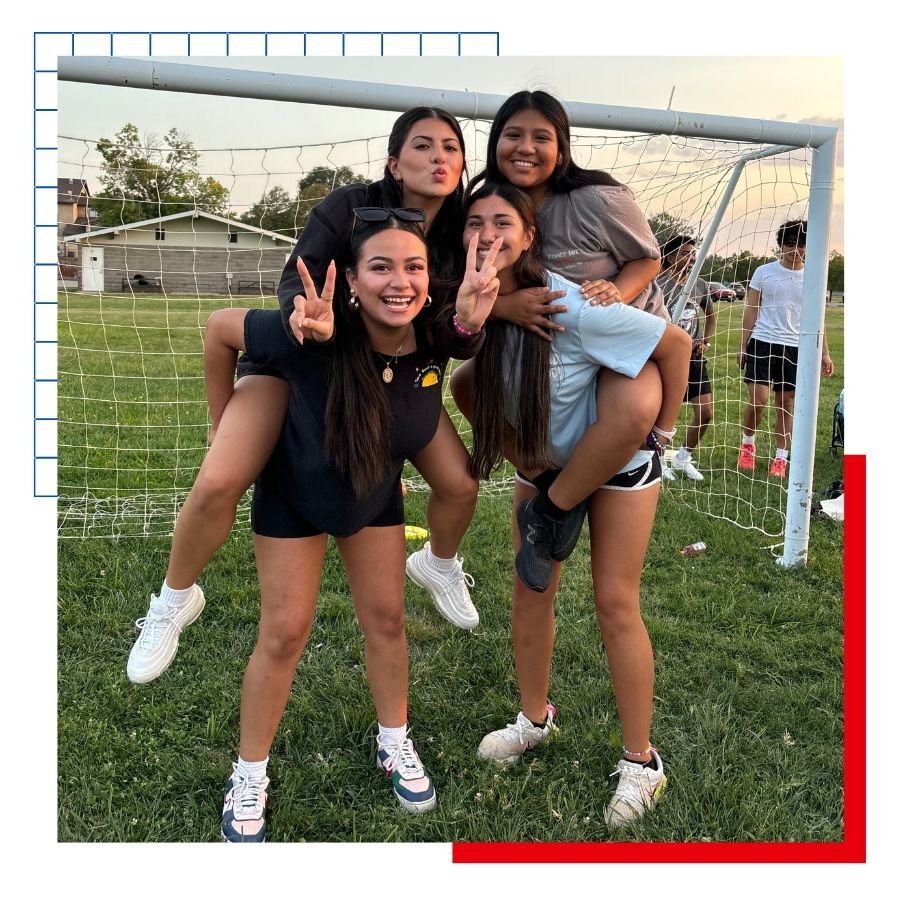 KU students in front of a soccer goal at a Field Day event.