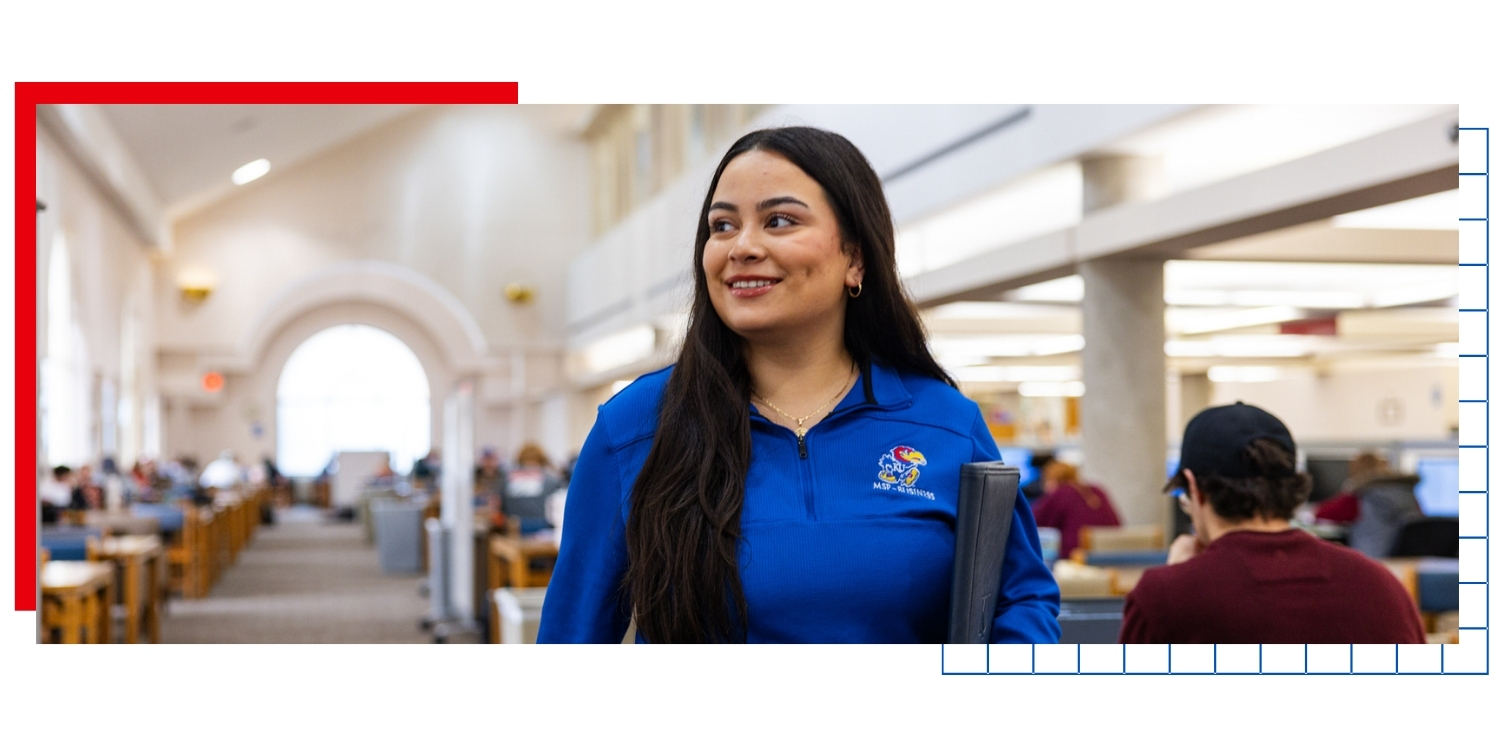 University of Kansas student Annalia Escalante walks through Anschutz Library