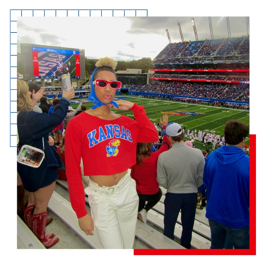 University of Kansas student Joshua Alston poses for a photo at the David Booth Memorial Stadium during a football game. 