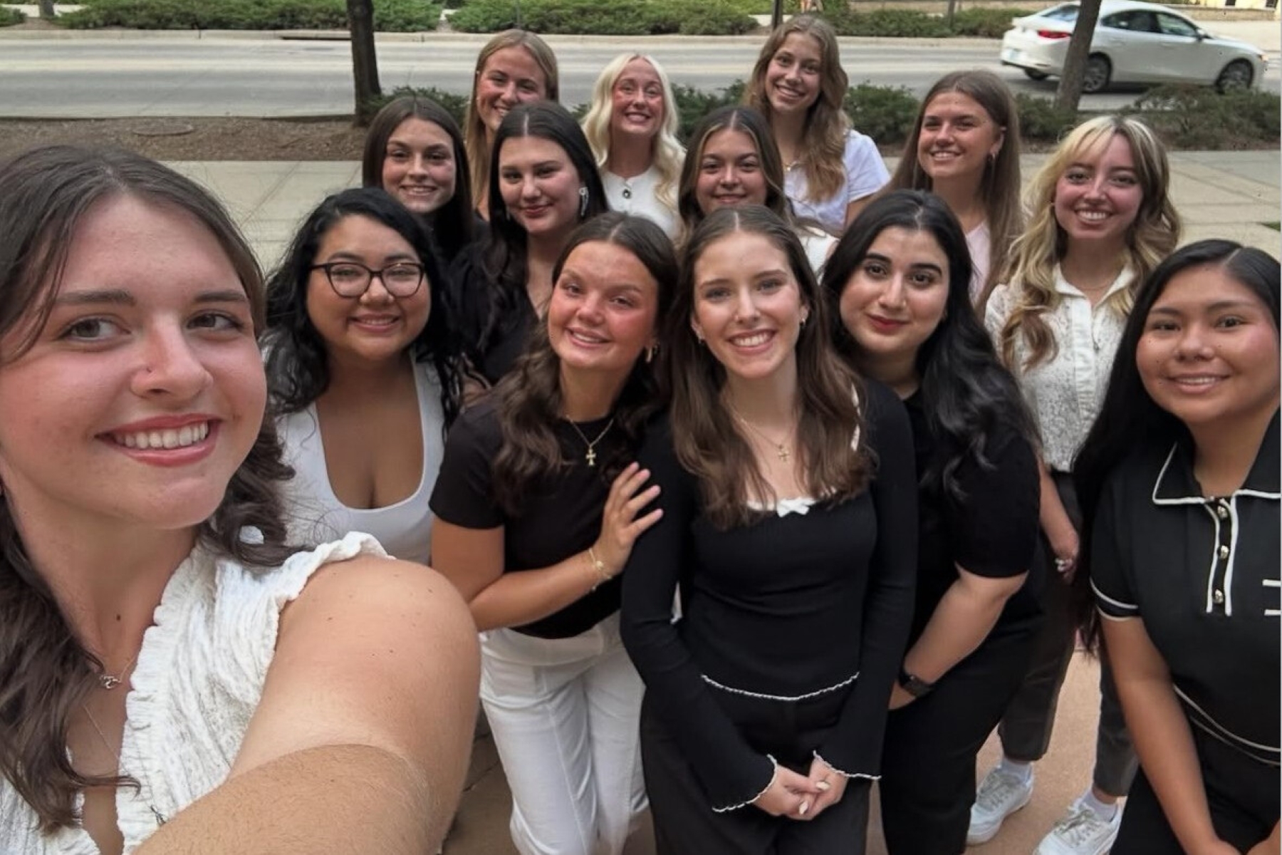 University of Kansas Interior Architecture students pose for a selfie on the KU campus. 