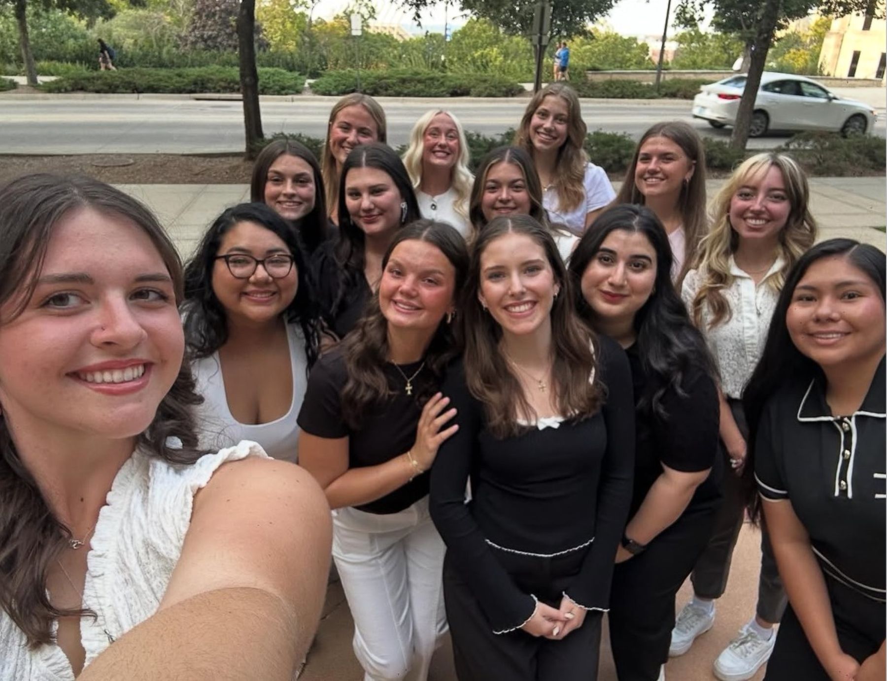 University of Kansas interior architecture students gather for a selfie on campus. 