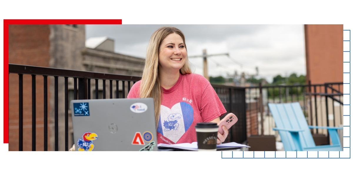 A KU Online student studies at a coffee shop in downtown Kansas City. 