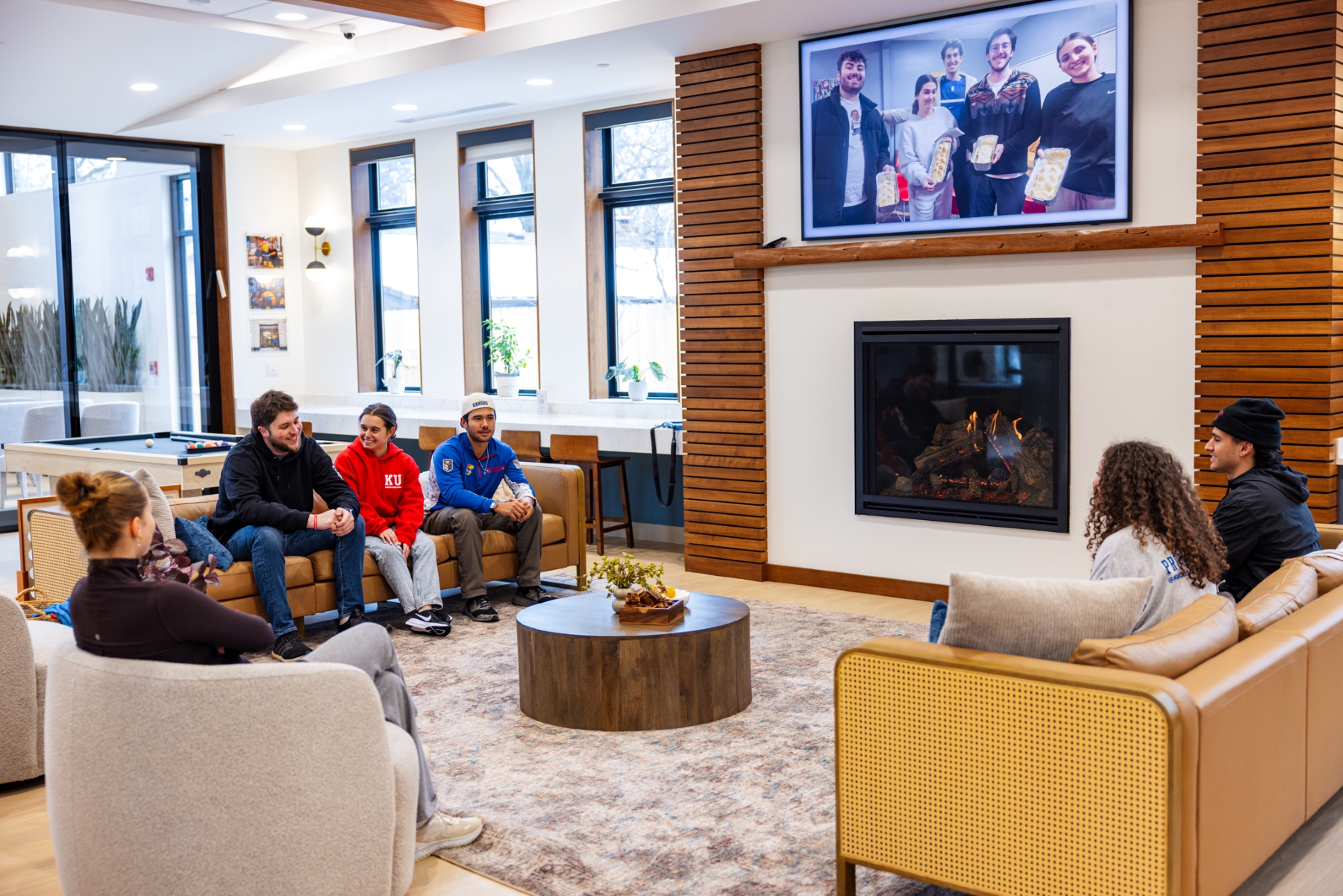 KU students gather in the living room of the new Chabad Center for Jewish life at the University of Kansas.