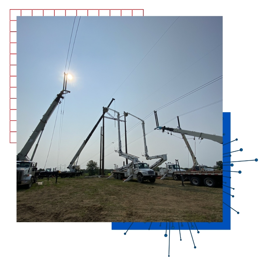 Cranes replacing old electricity poles with new ones as part of KU student Drake Schotland's field visit during a supply chain management internship with Evergy.