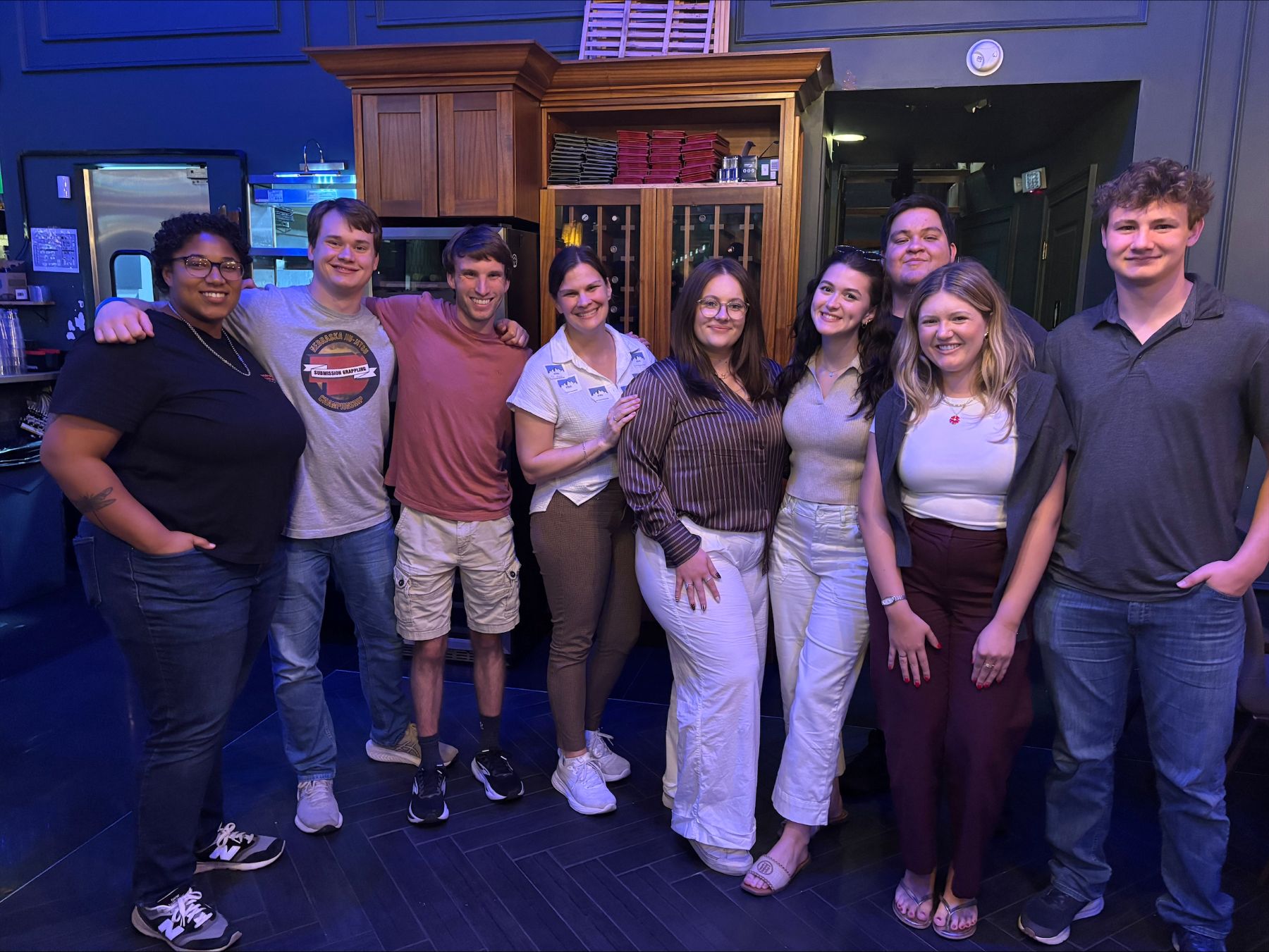 University of Kansas Masters of Public Administration students gather for a picture at an event.