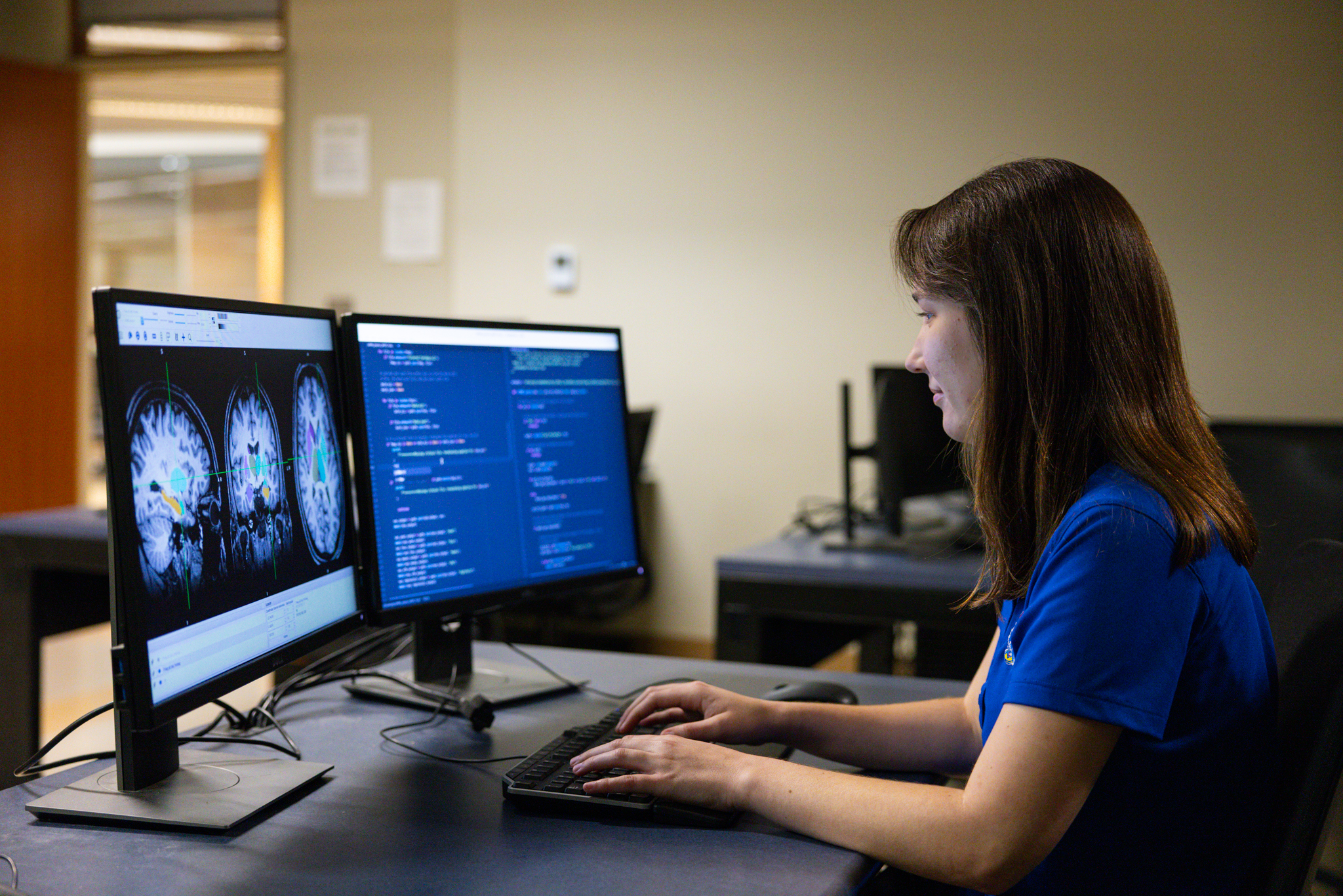 University of Kansas transfer engineering student Emily Messenger works at a computer lab.