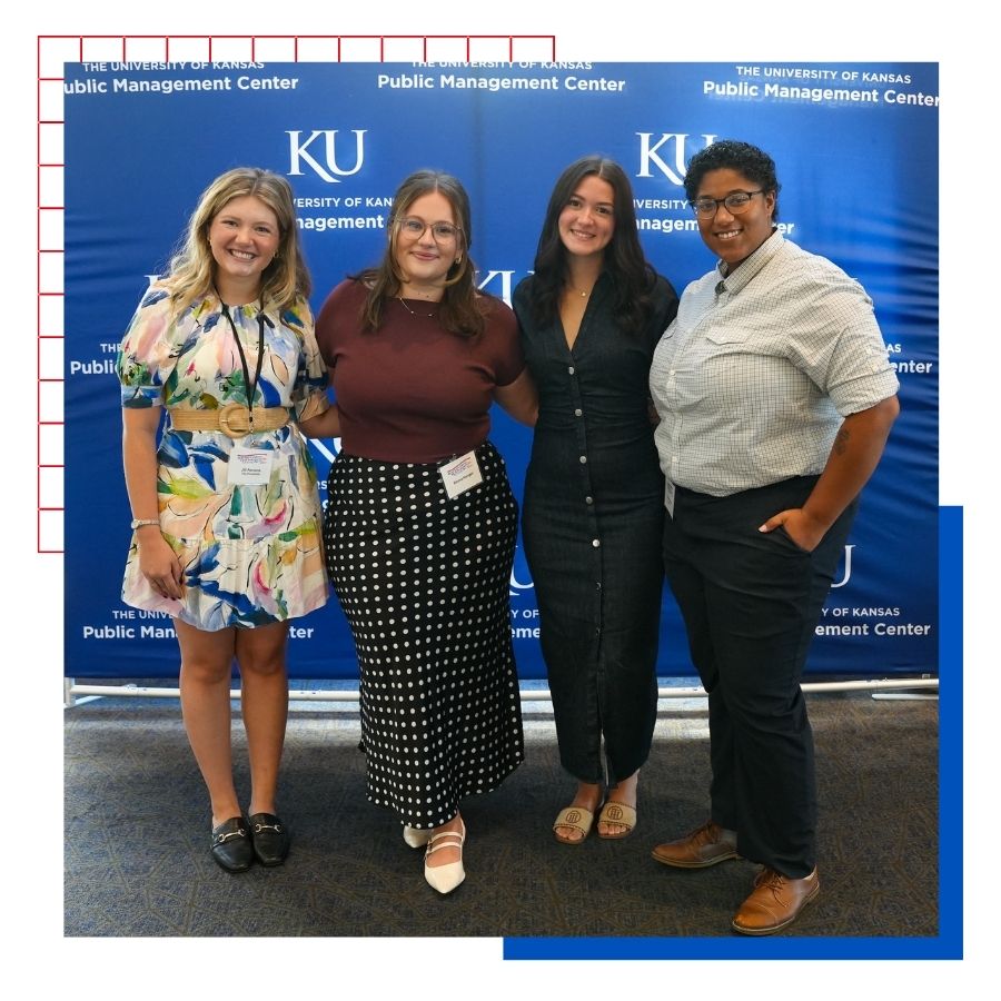 KU MPA students pose for a photo at a School of Public Affairs and Administration event.