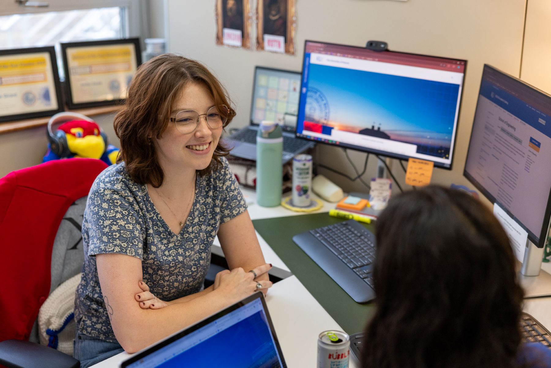 A University of Kansas academic advisor meets with a student in an office at the KU School of Engineering.