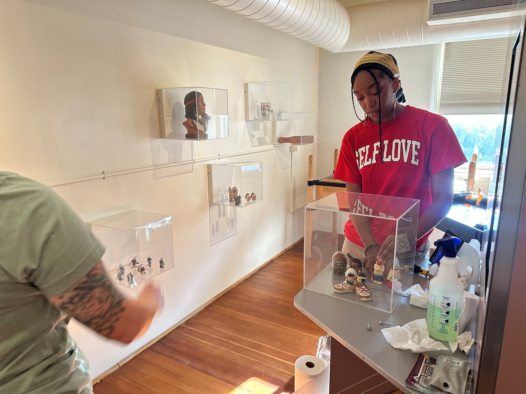 University of Kansas Indigenous Studies Master's student Lauryn Callis works behind the scenes in her internship at the Spencer Museum of Art.