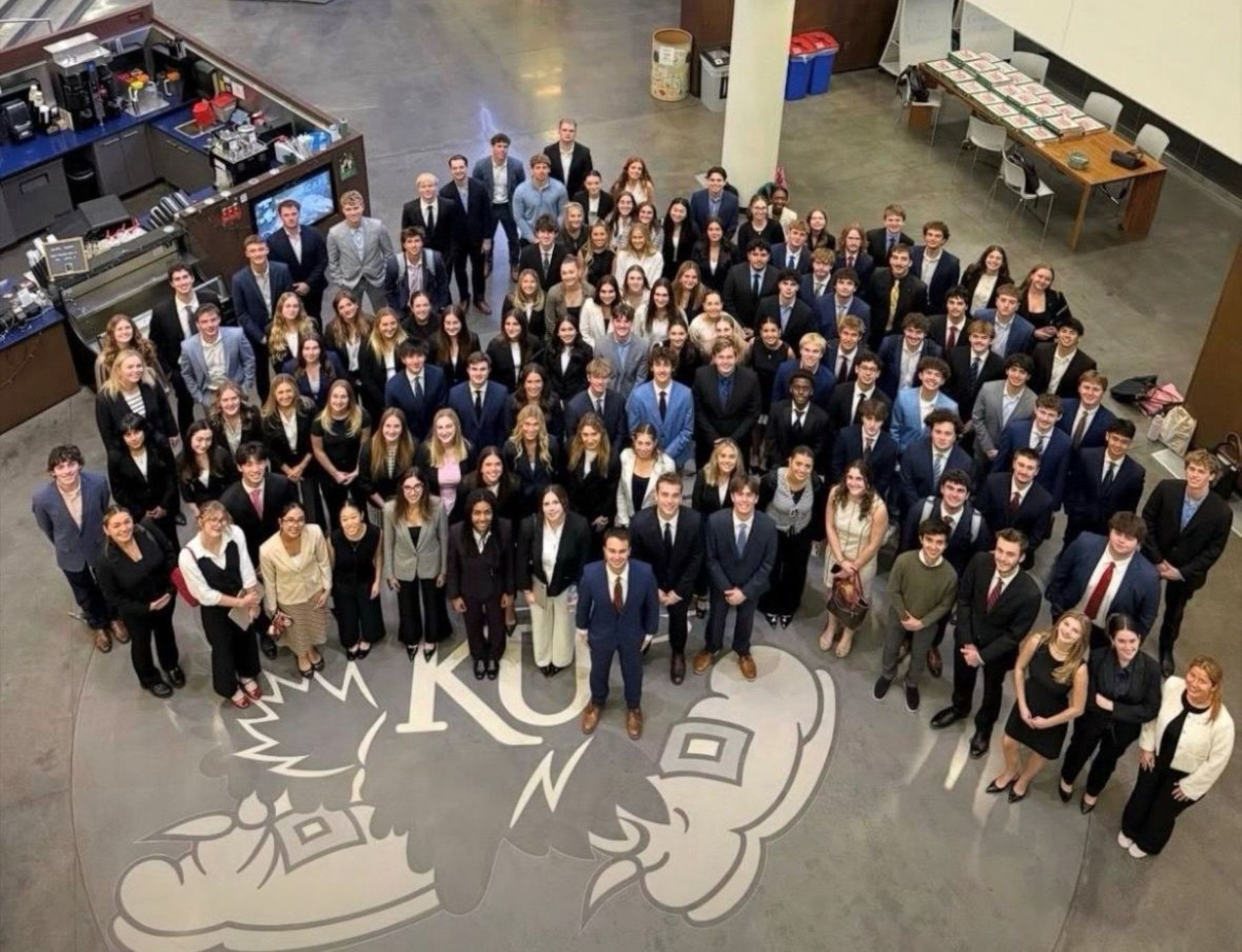 University of Kansas School of Business students gather for a large group portrait inside Capitol Federal Hall on the KU campus.