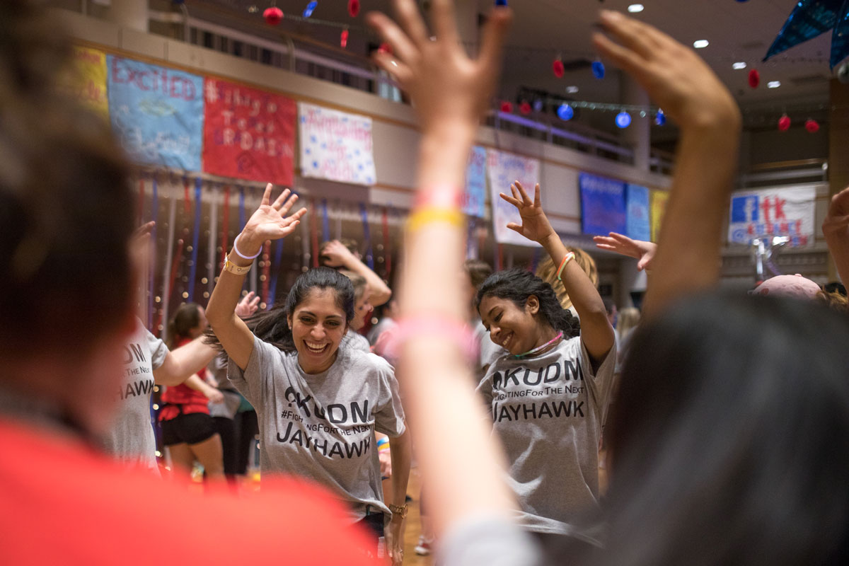 Students dancing in Kansas Union ballroom